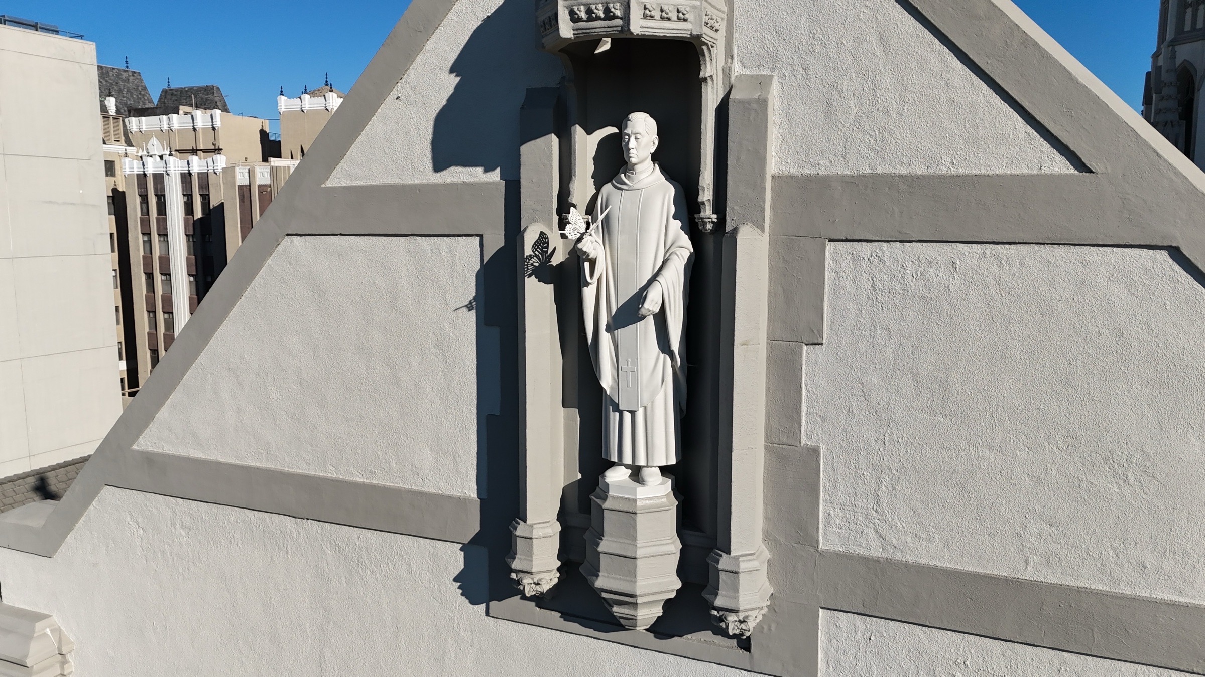 Statue of Sungsoo Kim Simon installed on the exterior of St. James’.